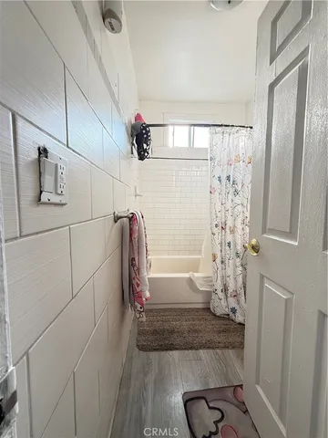 a bathroom with a sink and a shower