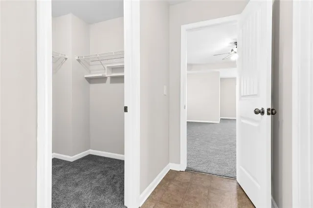 a view of a bathroom from a hallway