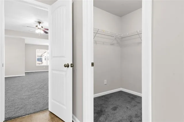 a view of a hallway with seating area