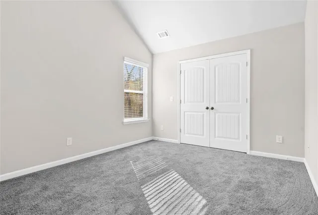 a view of a livingroom with wooden floor