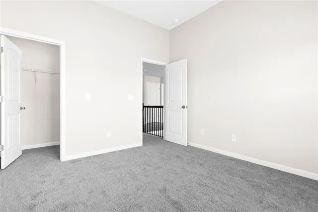 a bathroom with a sink toilet a mirror and shower