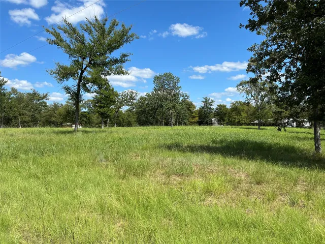 a view of a golf course with a lake