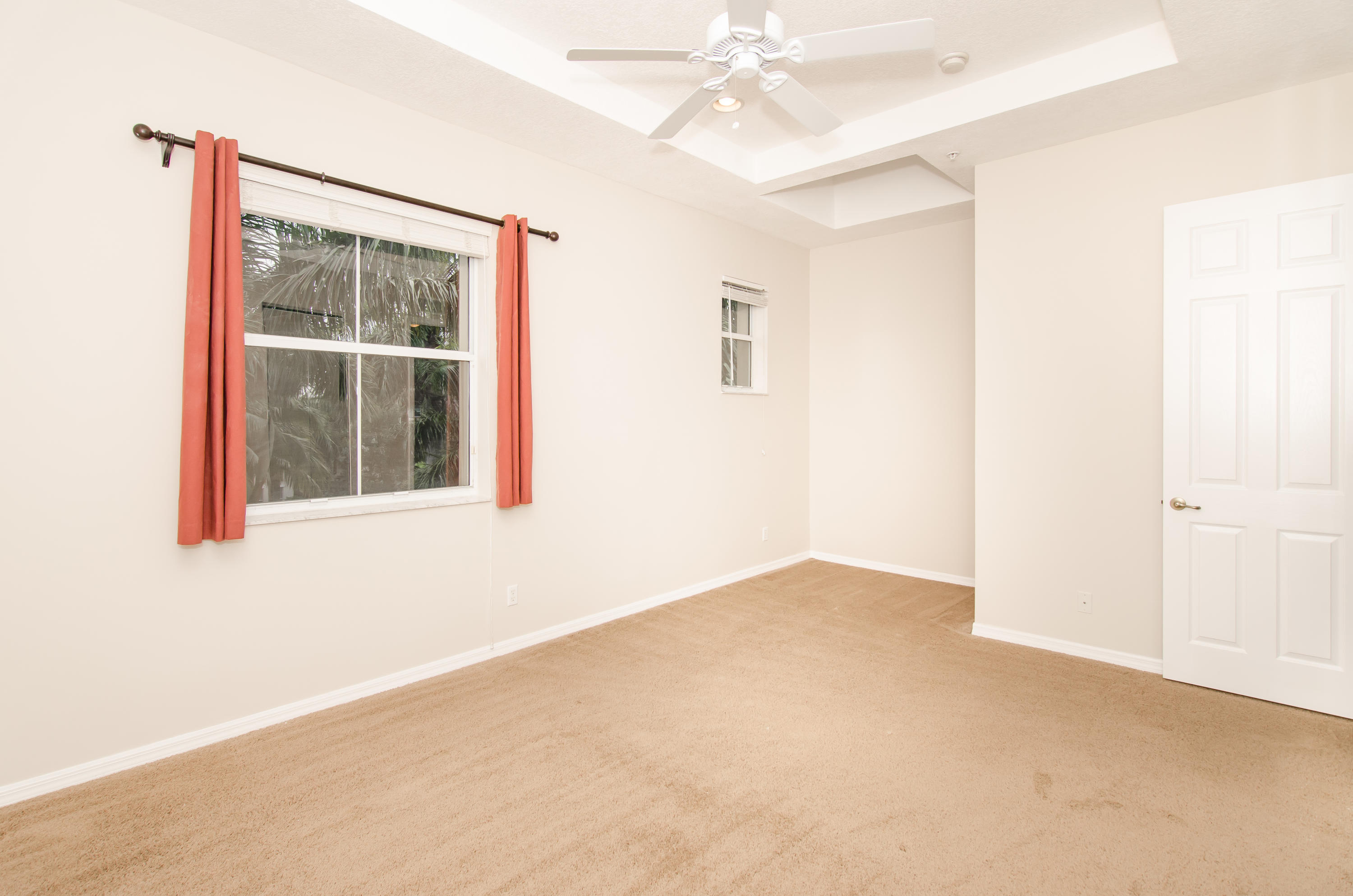 4281 East Main Street Jupiter, FL 33458 - Photo 11 of 37 a view of an empty room with a window