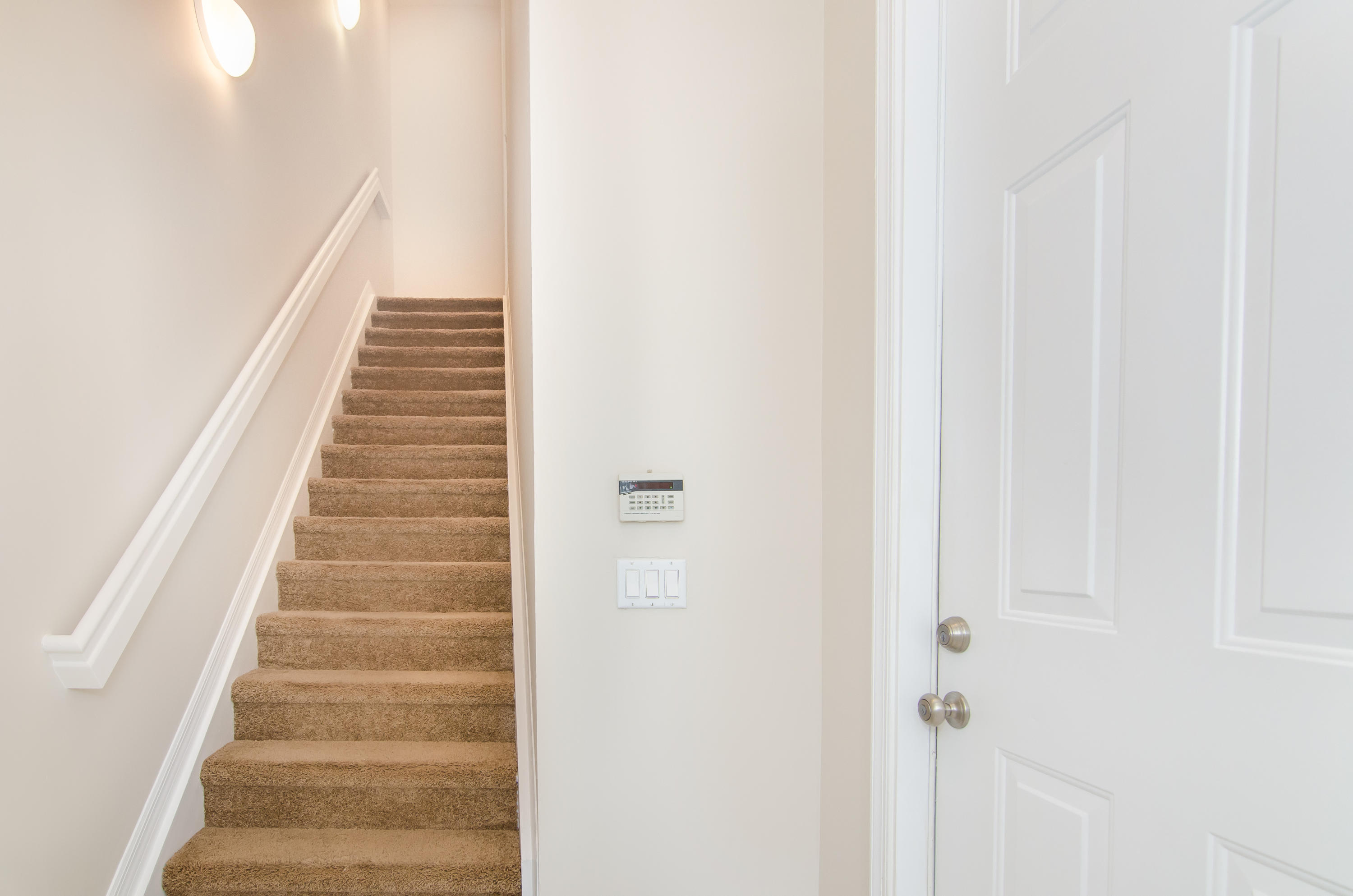 4281 East Main Street Jupiter, FL 33458 - Photo 13 of 37 a view of staircase with white walls