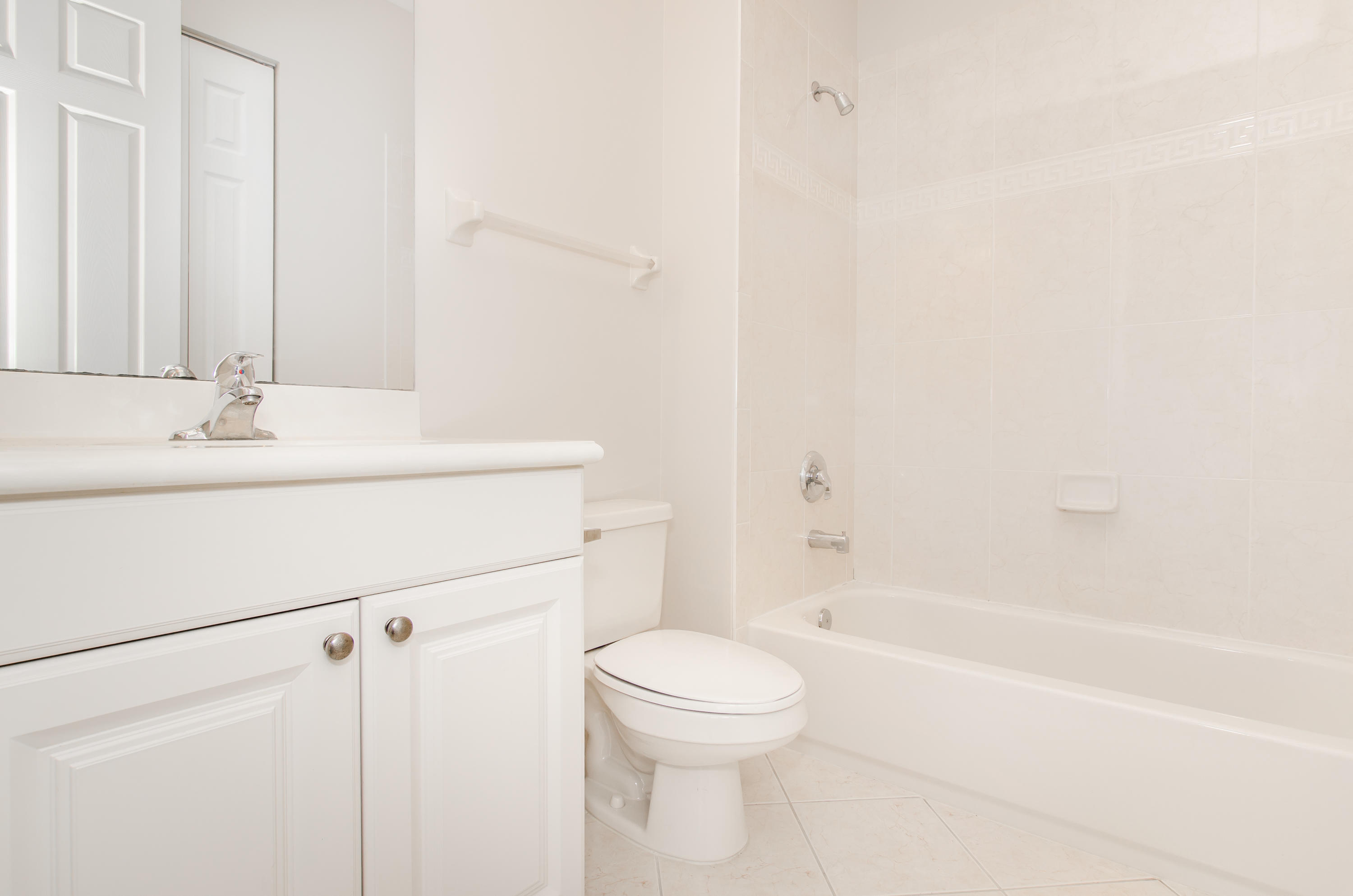 4281 East Main Street Jupiter, FL 33458 - Photo 29 of 37 a bathroom with a sink a toilet and a bathtub