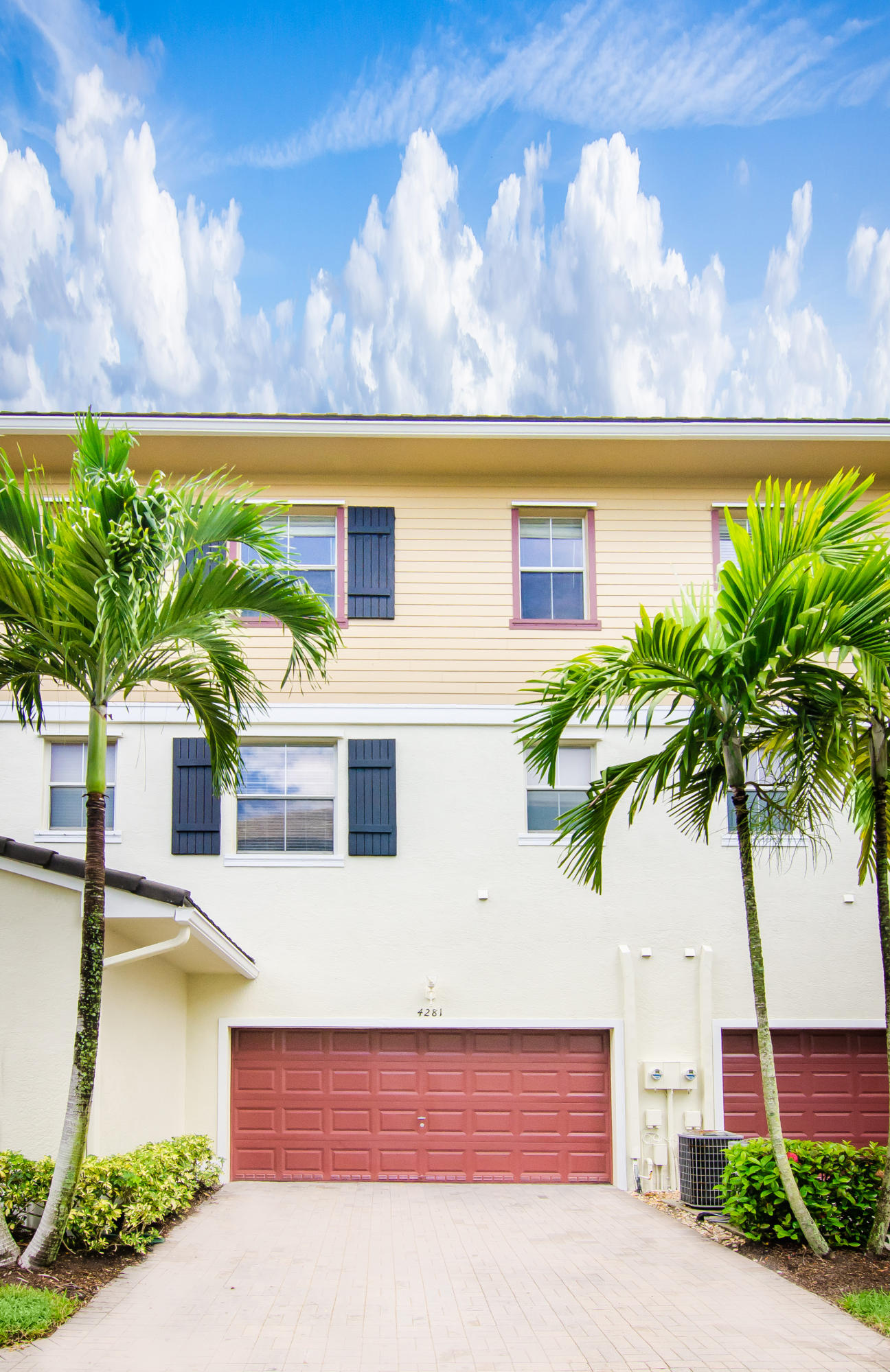 4281 East Main Street Jupiter, FL 33458 - Photo 33 of 37 a front view of a house with garden