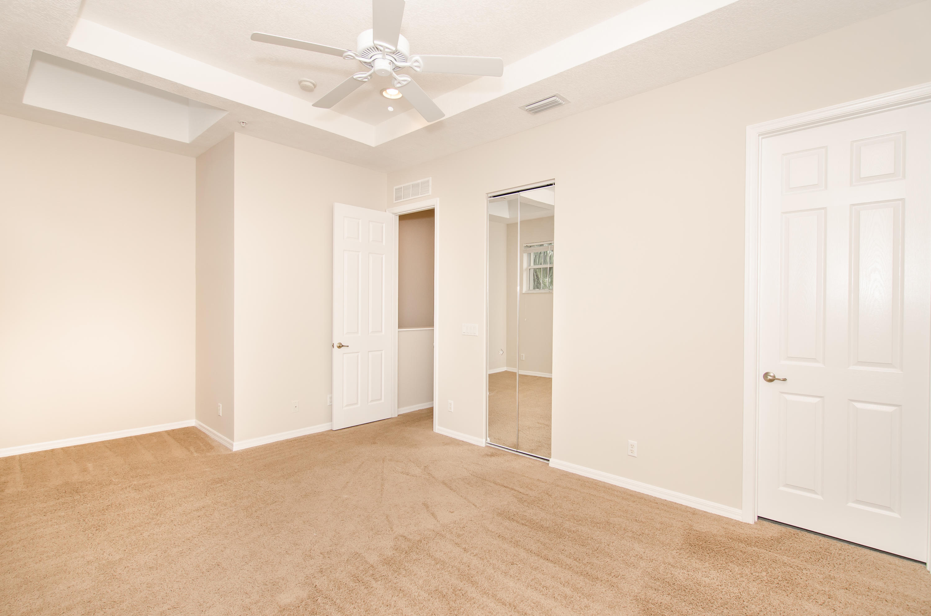 4281 East Main Street Jupiter, FL 33458 - Photo 10 of 37 a view of an empty room with a window