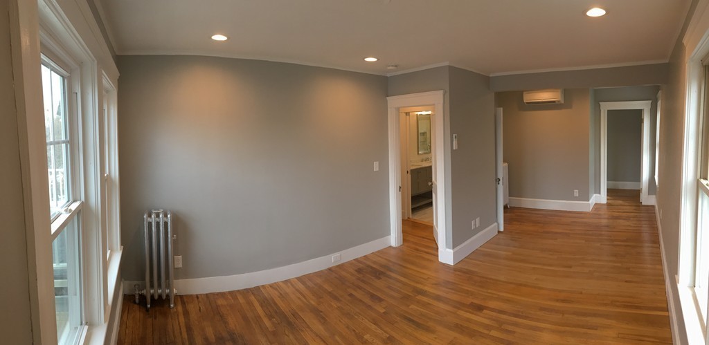 22 Sutherland Road Arlington, MA 02476 - Photo 15 of 30 a view of hallway with wooden floor