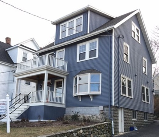 22 Sutherland Road Arlington, MA 02476 - Photo 2 of 30 a front view of a house with balcony