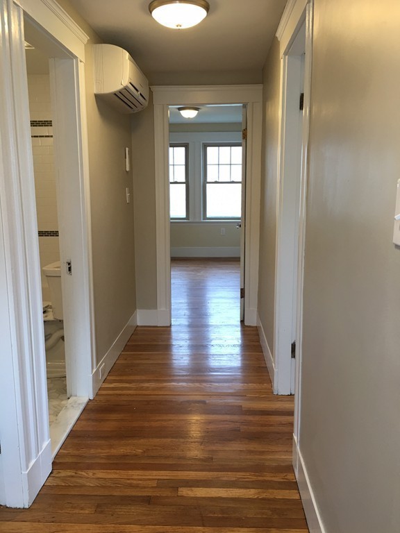 22 Sutherland Road Arlington, MA 02476 - Photo 26 of 30 a view of gallery with wooden floor