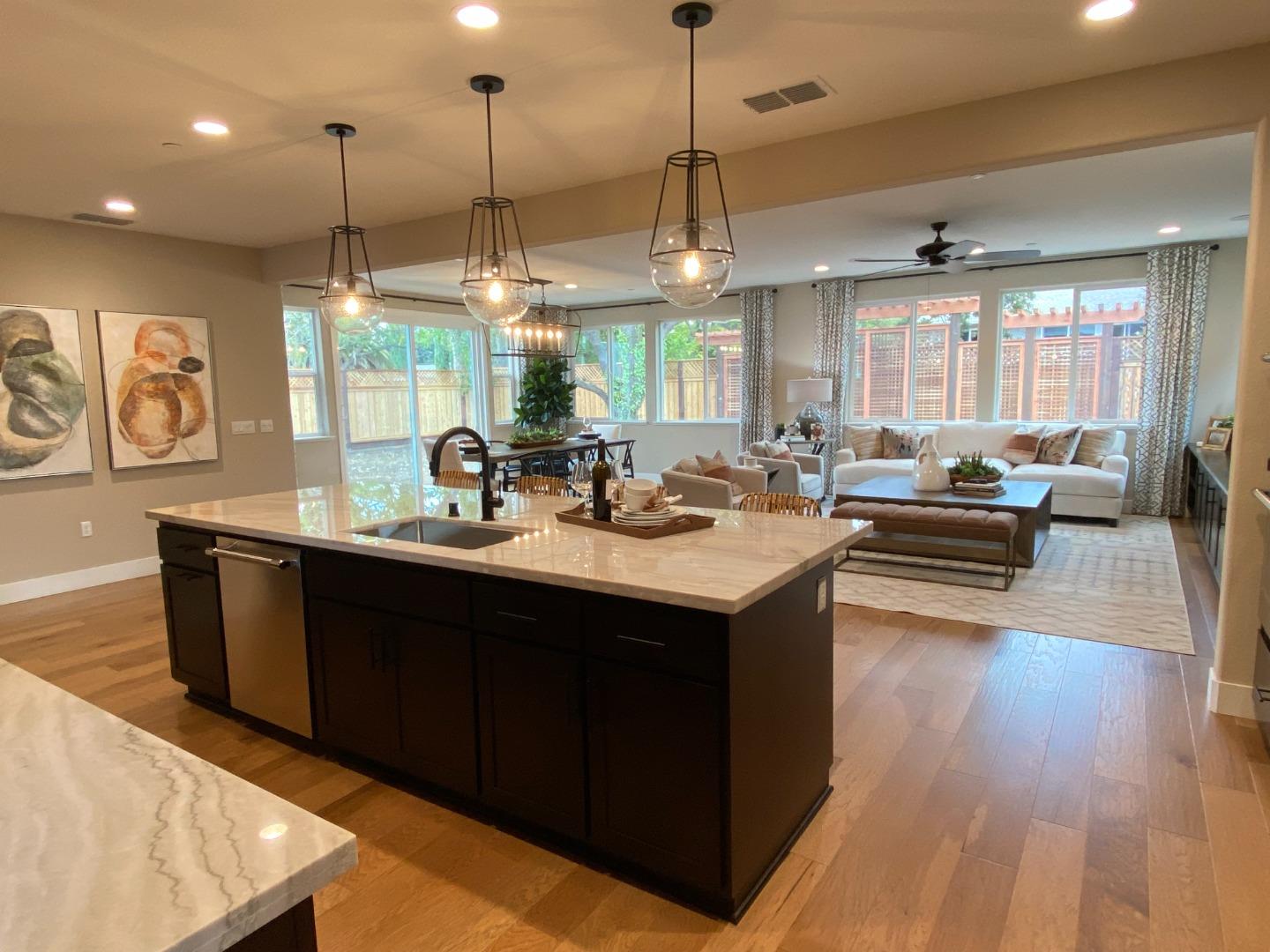 2623 Smith Ranch Walnut Creek, CA 94598 - Photo 7 of 15 a kitchen with a sink a counter space dining table and chairs
