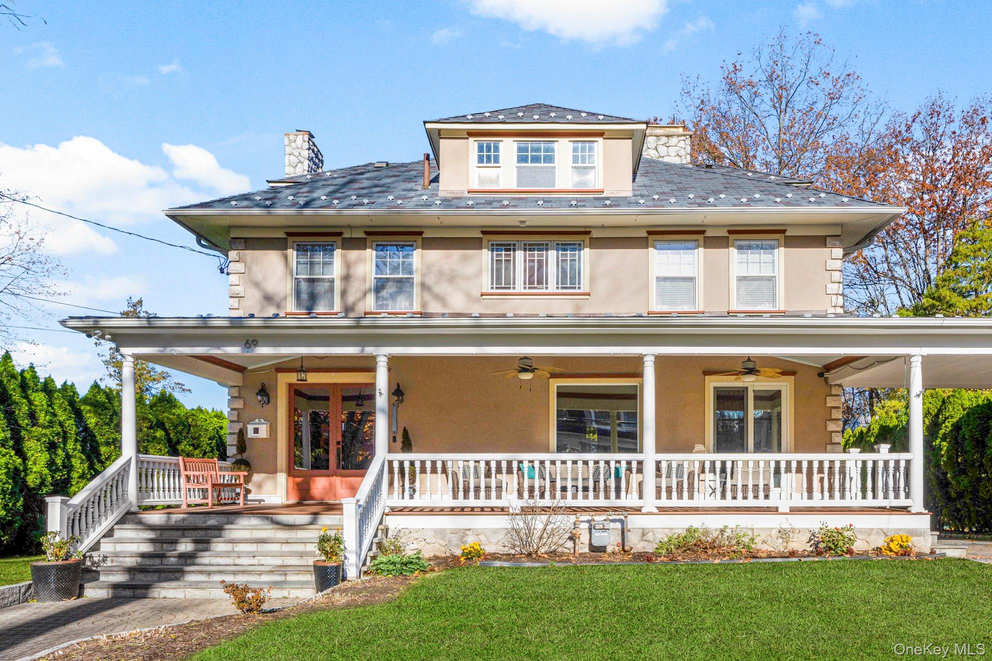 69 Irving Place New Rochelle, NY 10801 - Photo 1 of 46 front view of a house with a yard