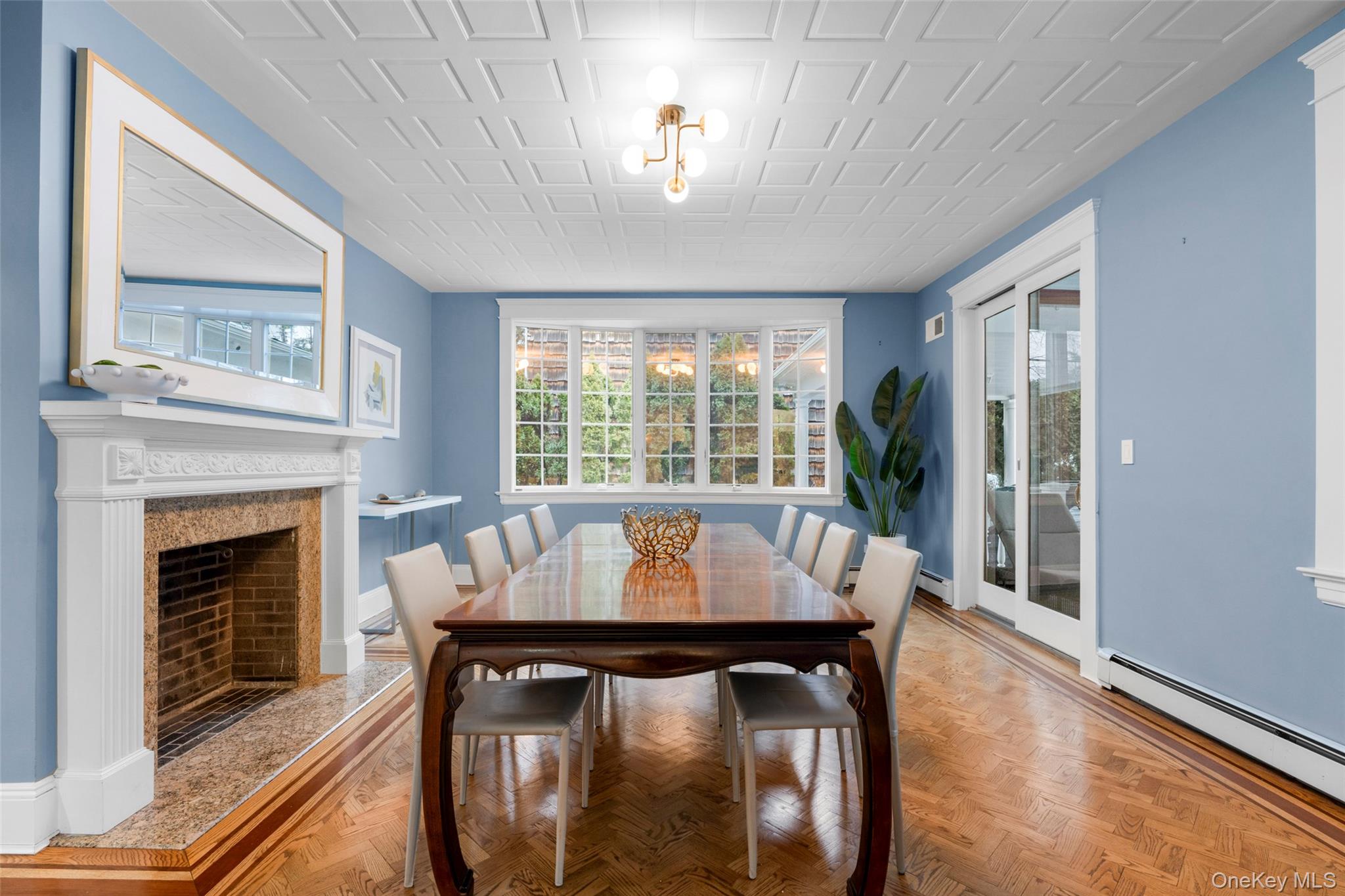 69 Irving Place New Rochelle, NY 10801 - Photo 11 of 46 a view of a dining room with furniture window and wooden floor