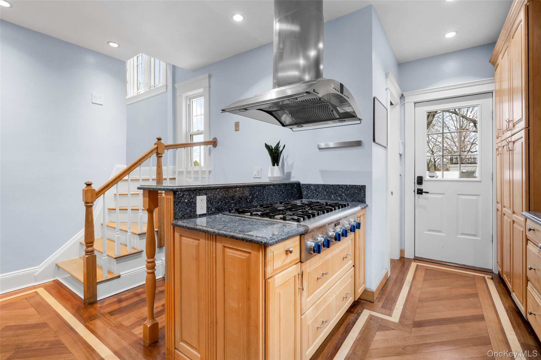 69 Irving Place New Rochelle, NY 10801 - Photo 16 of 46 a kitchen with stainless steel appliances granite countertop a stove and a view of kitchen