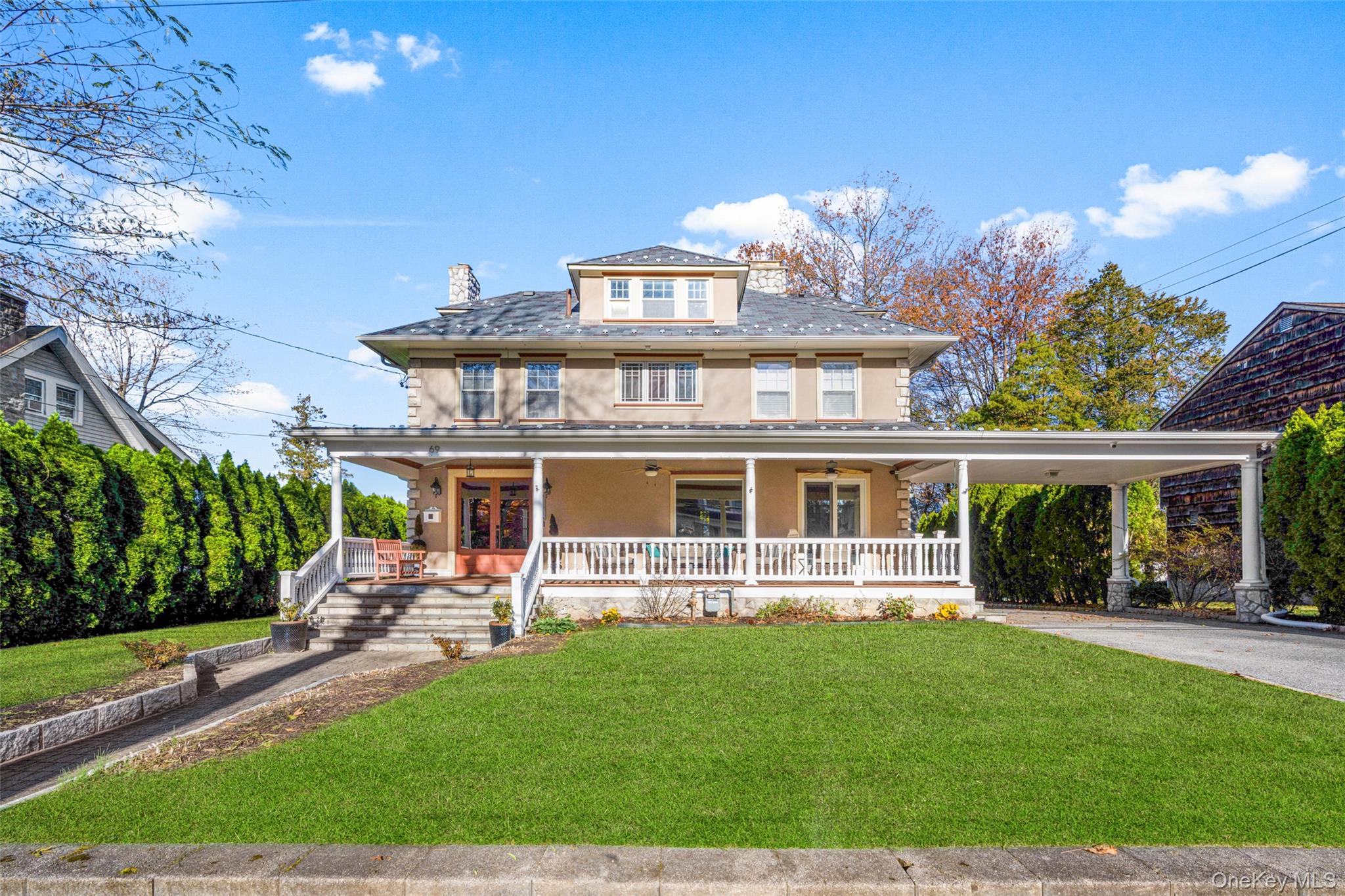 69 Irving Place New Rochelle, NY 10801 - Photo 2 of 46 front view of a house with a yard