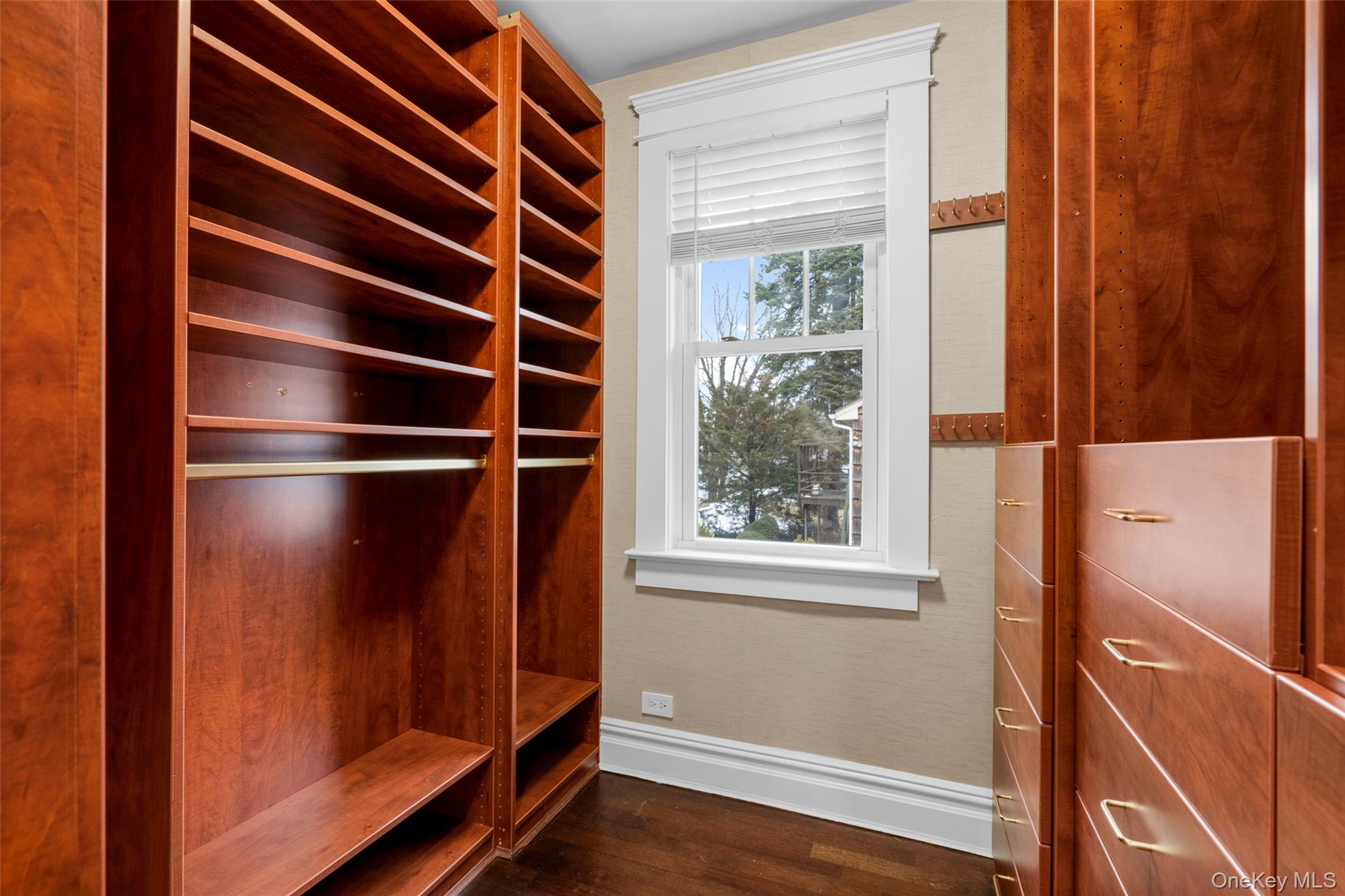 69 Irving Place New Rochelle, NY 10801 - Photo 22 of 46 a view of walk in closet with empty racks