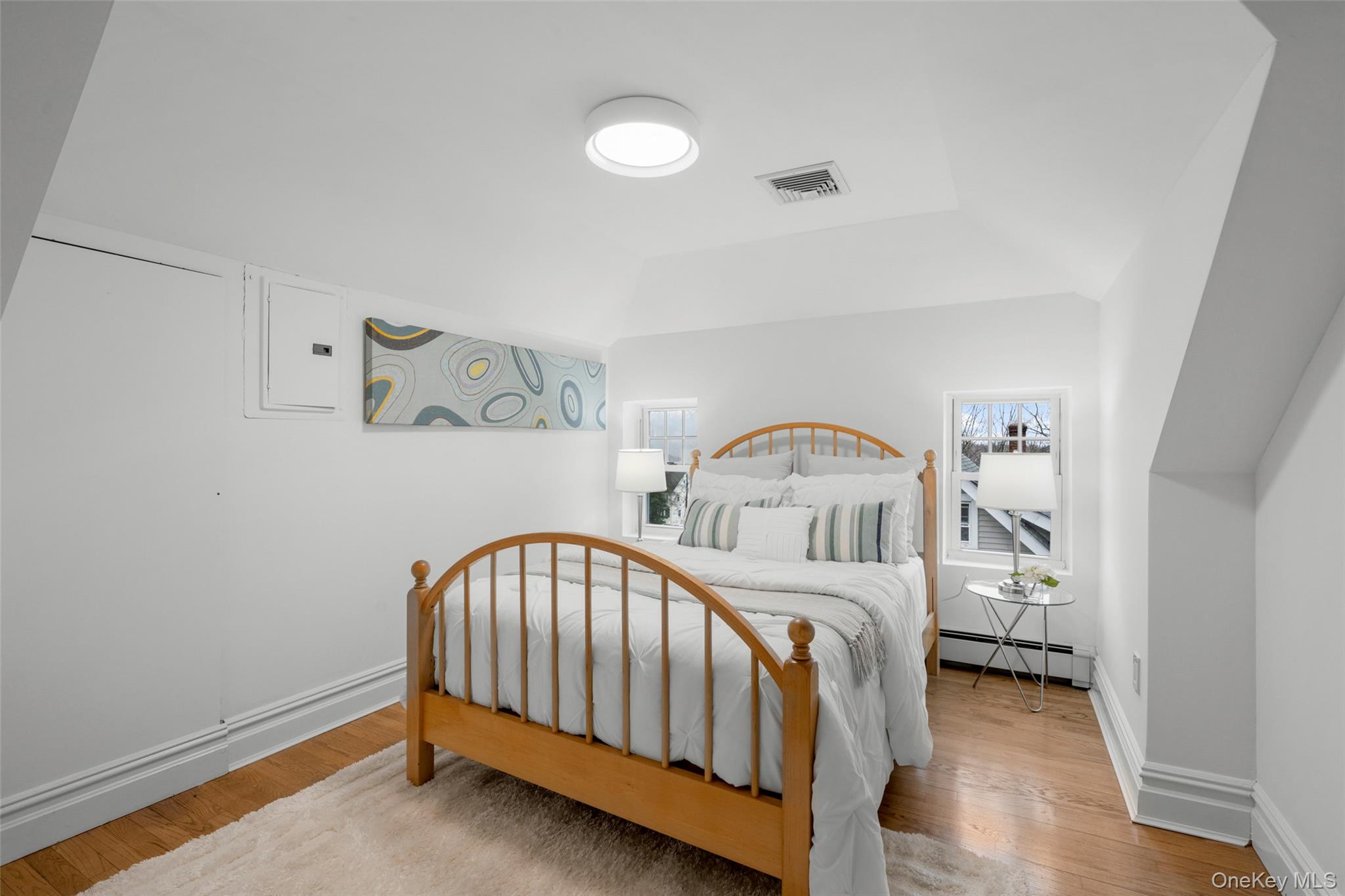 69 Irving Place New Rochelle, NY 10801 - Photo 27 of 46 a bedroom with furniture and a window