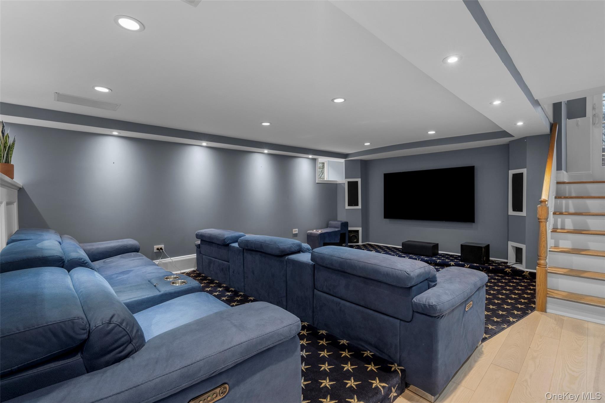 69 Irving Place New Rochelle, NY 10801 - Photo 31 of 46 a living room with furniture and a flat screen tv