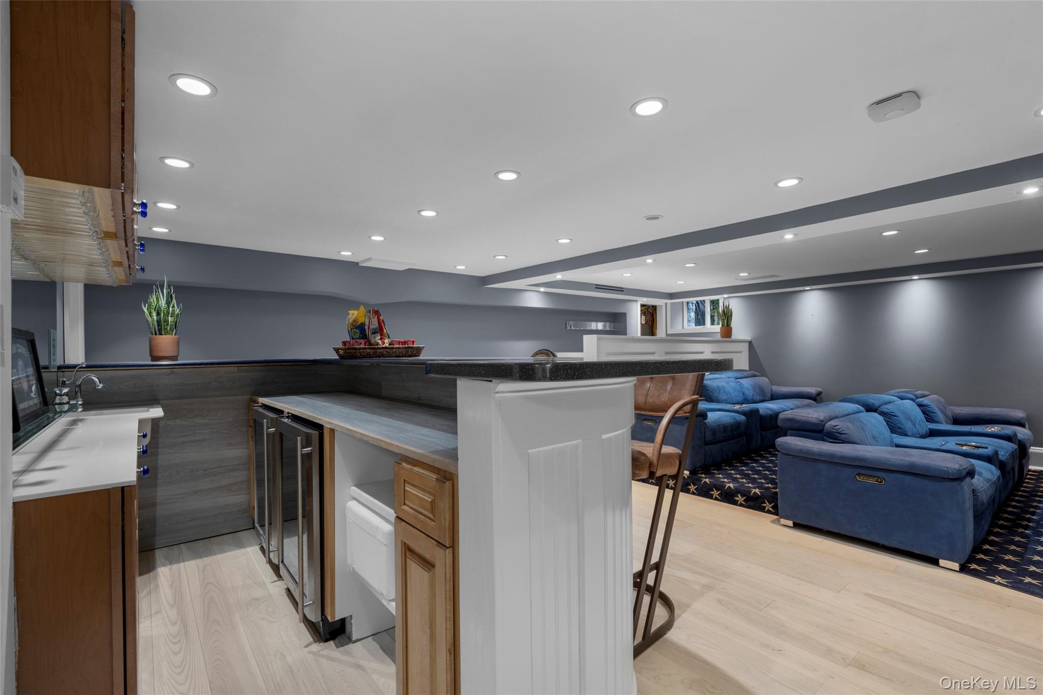 69 Irving Place New Rochelle, NY 10801 - Photo 33 of 46 a living room with furniture and a flat screen tv