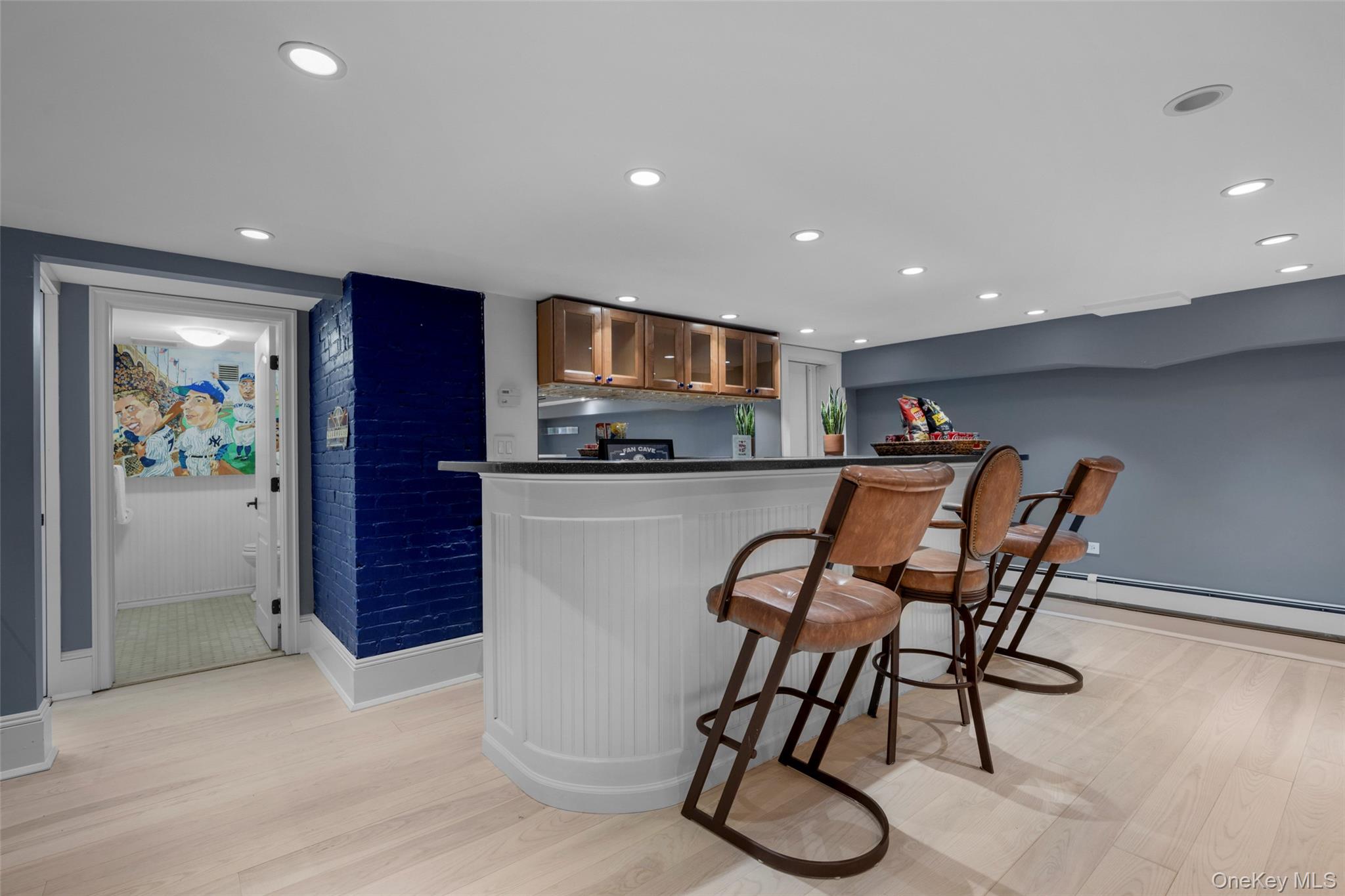 69 Irving Place New Rochelle, NY 10801 - Photo 34 of 46 a kitchen with stainless steel appliances kitchen island granite countertop a refrigerator and a stove top oven