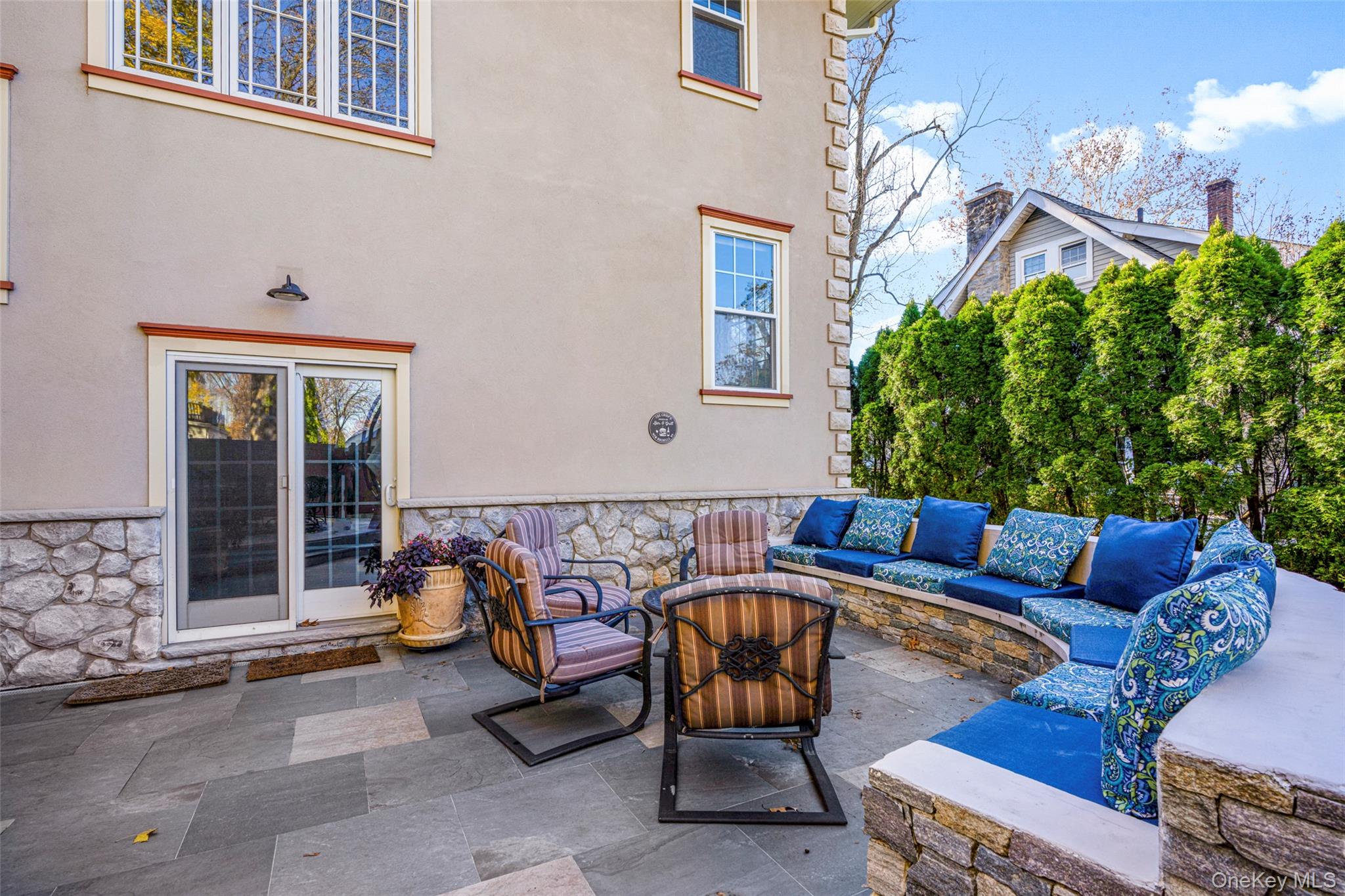 69 Irving Place New Rochelle, NY 10801 - Photo 37 of 46 a building outdoor space with patio furniture