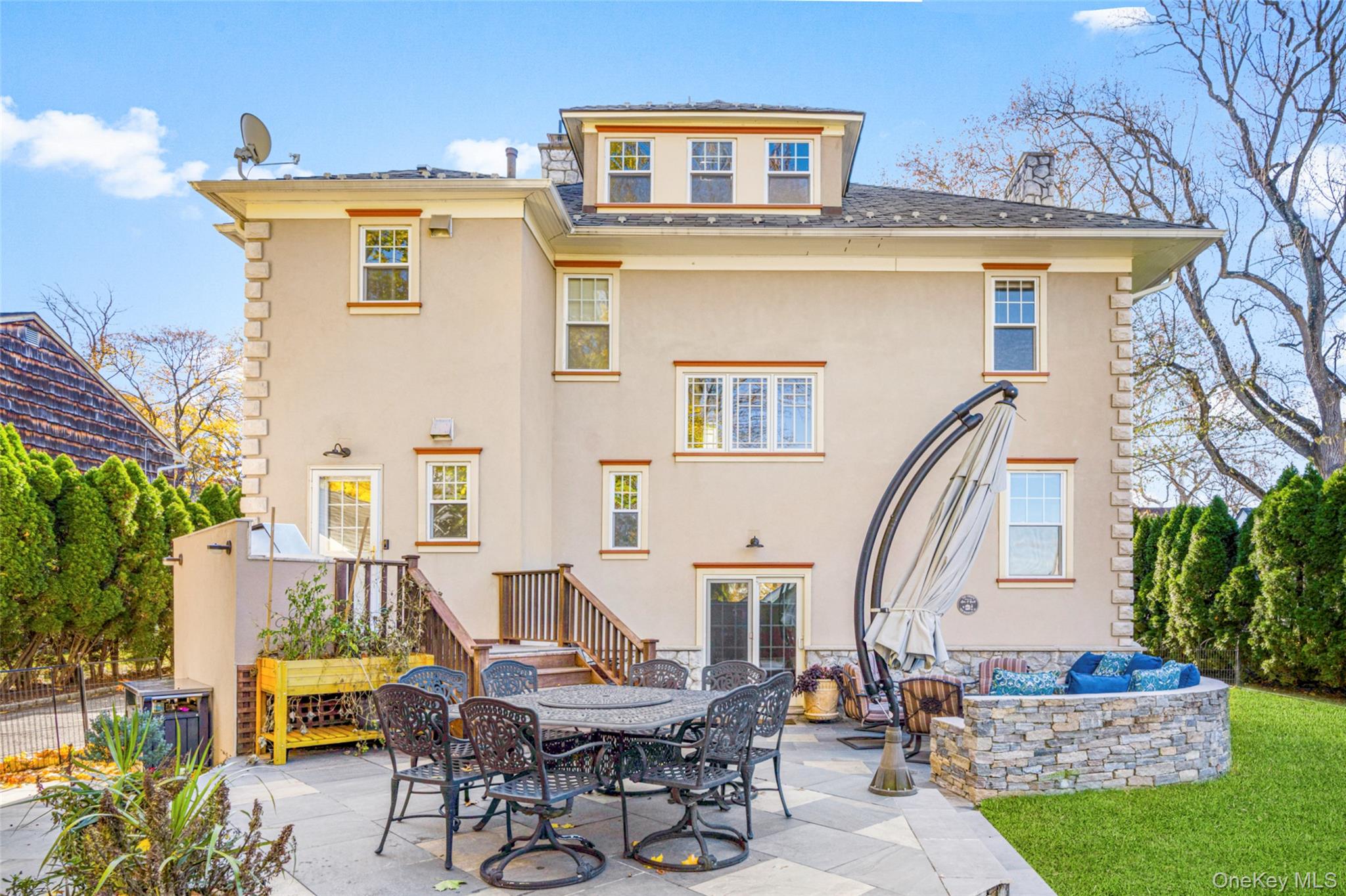 69 Irving Place New Rochelle, NY 10801 - Photo 39 of 46 a view of a building with outdoor seating space