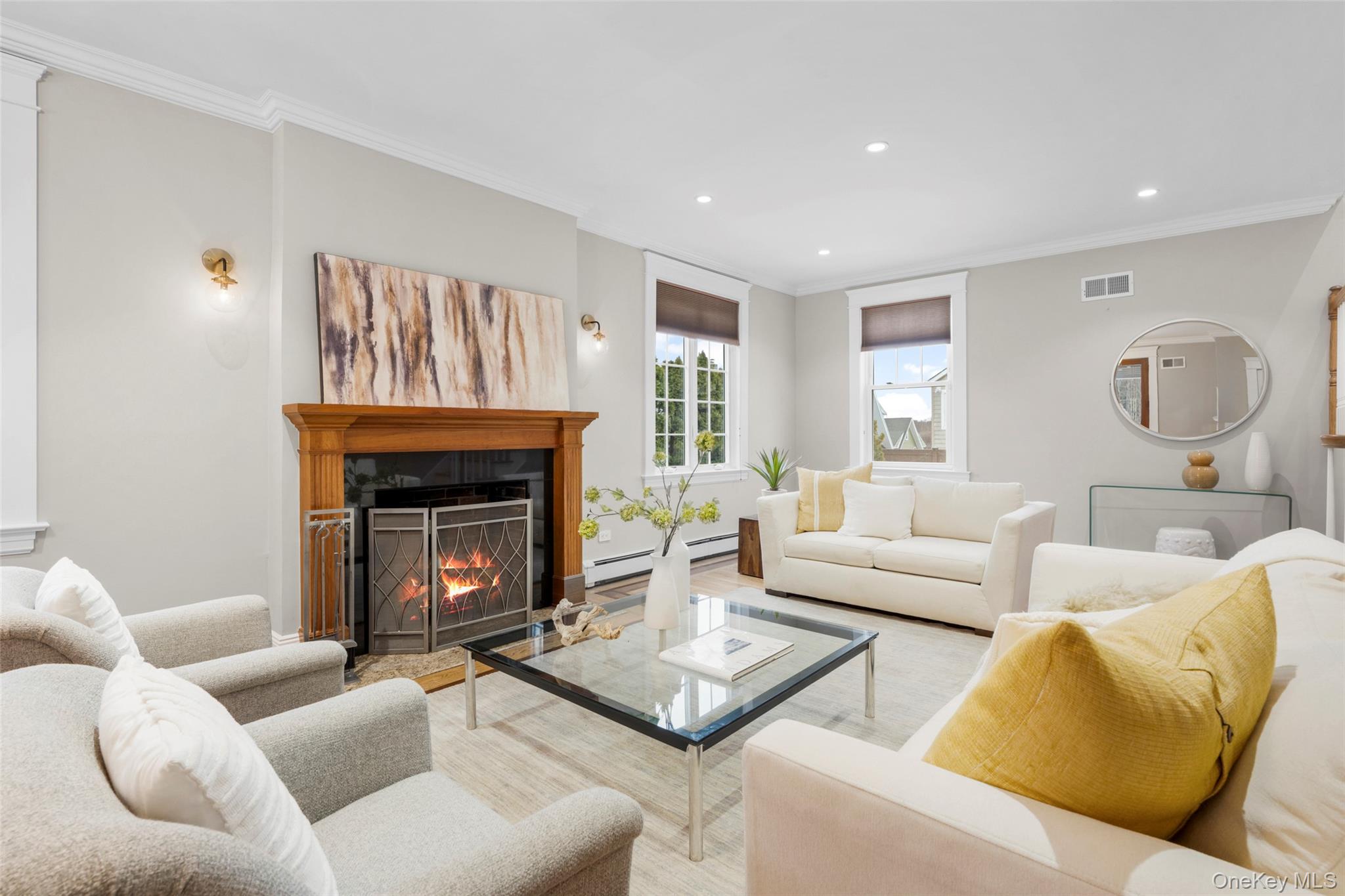 69 Irving Place New Rochelle, NY 10801 - Photo 6 of 46 a living room with furniture and a fireplace