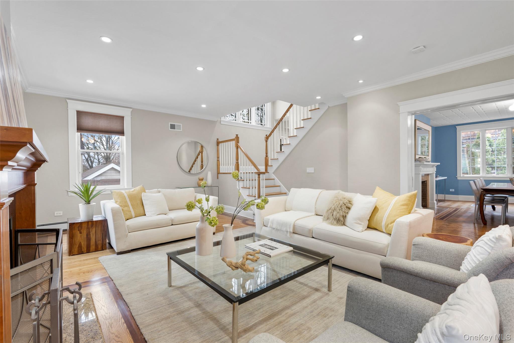 69 Irving Place New Rochelle, NY 10801 - Photo 8 of 46 a living room with furniture and wooden floor