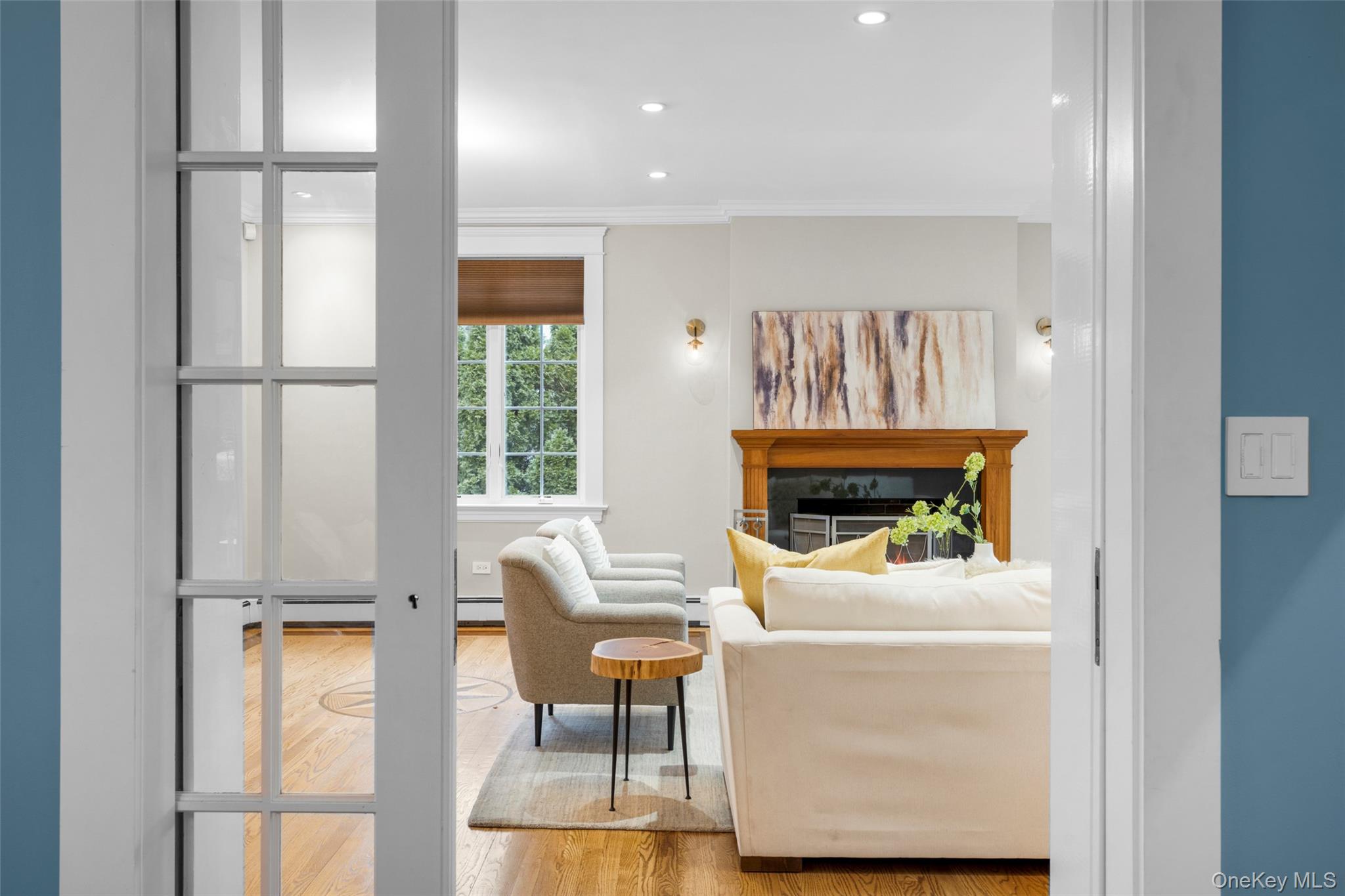 69 Irving Place New Rochelle, NY 10801 - Photo 9 of 46 a living room with furniture and a window