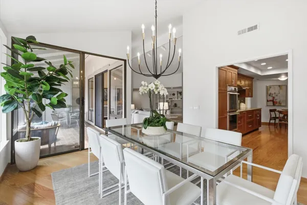 a kitchen with granite countertop stainless steel appliances and wooden cabinets