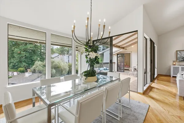 a kitchen with stainless steel appliances granite countertop a sink stove and microwave