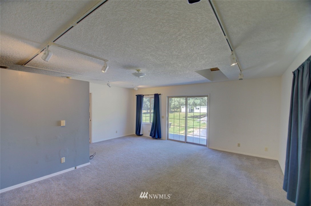 575 Telegraph Road Winlock, WA 98596 - Photo 5 of 30 a view of an empty room with a window