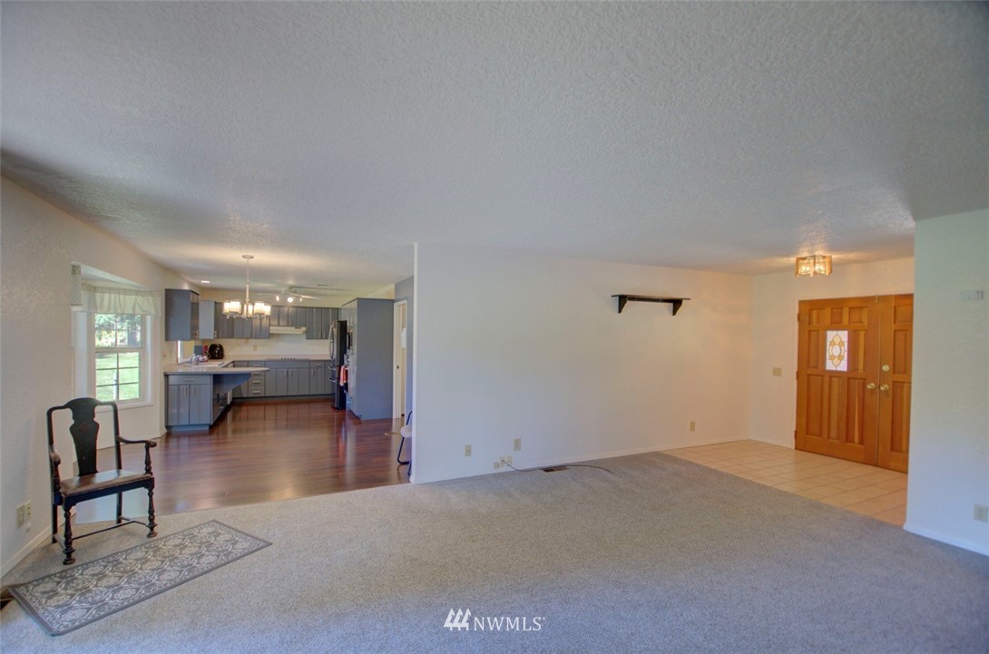 575 Telegraph Road Winlock, WA 98596 - Photo 7 of 30 a view of a livingroom with furniture and a flat screen tv