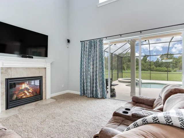 a kitchen with stainless steel appliances granite countertop a refrigerator sink and stove