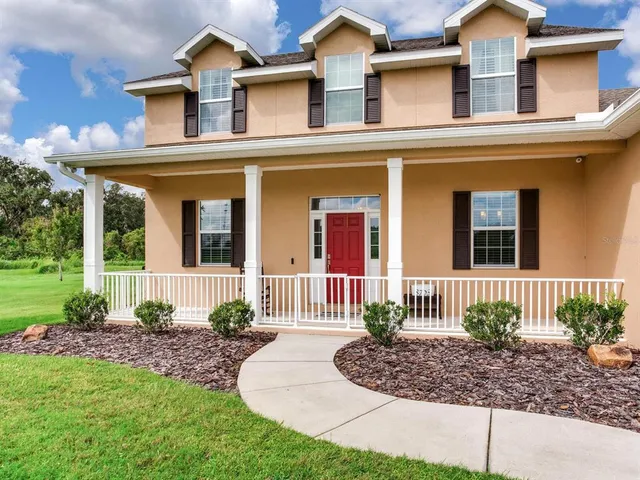 a view of a porch with a yard