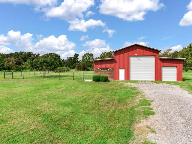 a view of a backyard with a garden