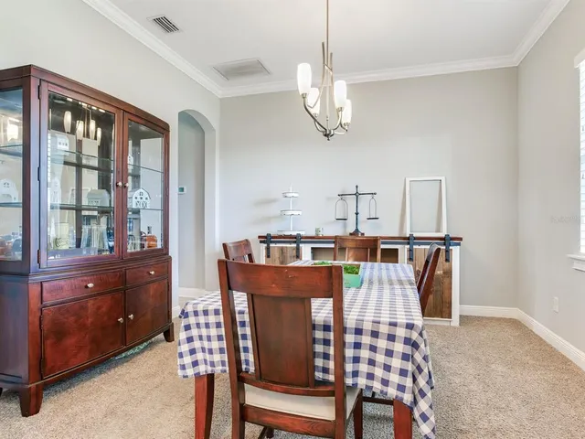 a view of a workspace with furniture