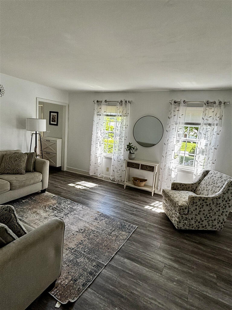 1032 Windy Ridge Drive Bedford, VA 24523 - Photo 6 of 27 a living room with furniture and a wooden floor