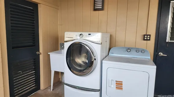 a utility room with dryer and washer