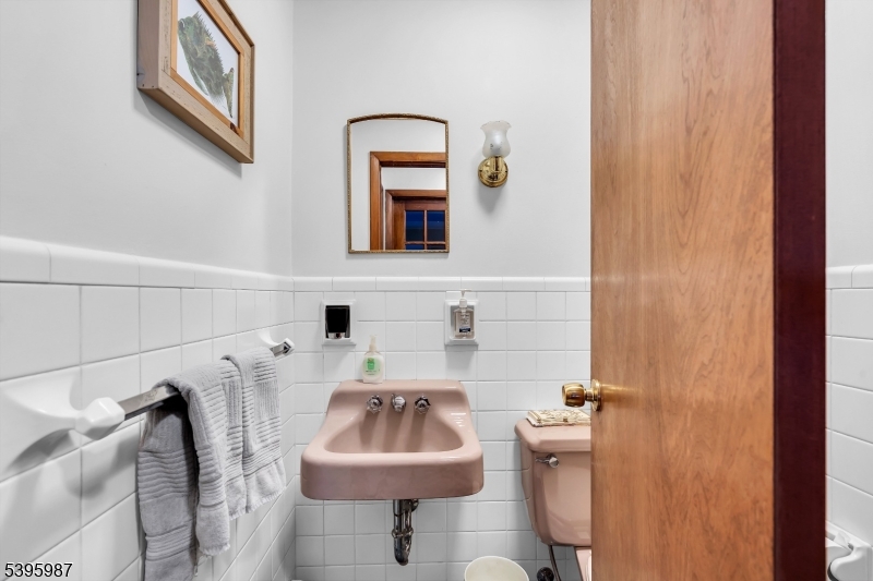 106 Rocktown Road Ringoes, NJ 08551 - Photo 12 of 36 a bathroom with a toilet sink and mirror