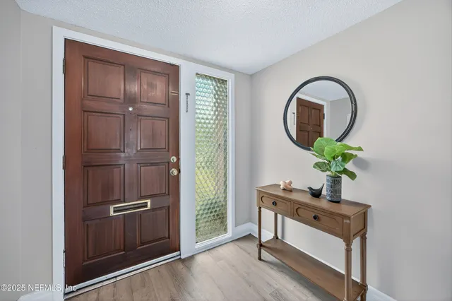 a view of a room that has a bench in it