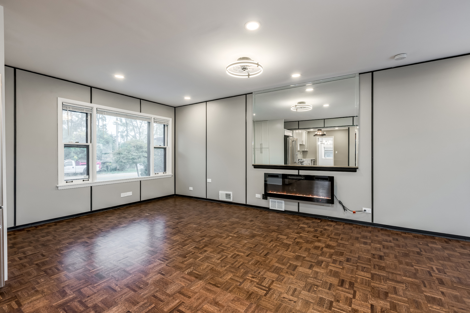 9539 Lorel Avenue Skokie, IL 60077 - Photo 15 of 38 a view of an empty room with a window