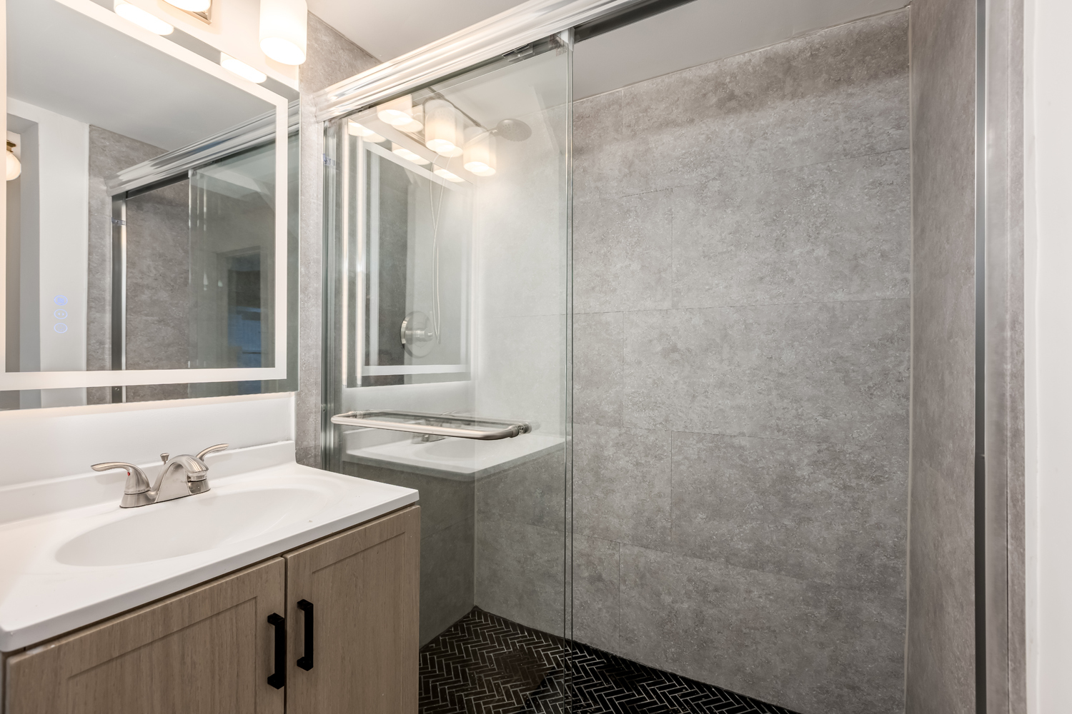 9539 Lorel Avenue Skokie, IL 60077 - Photo 18 of 38 a bathroom with a sink and a mirror