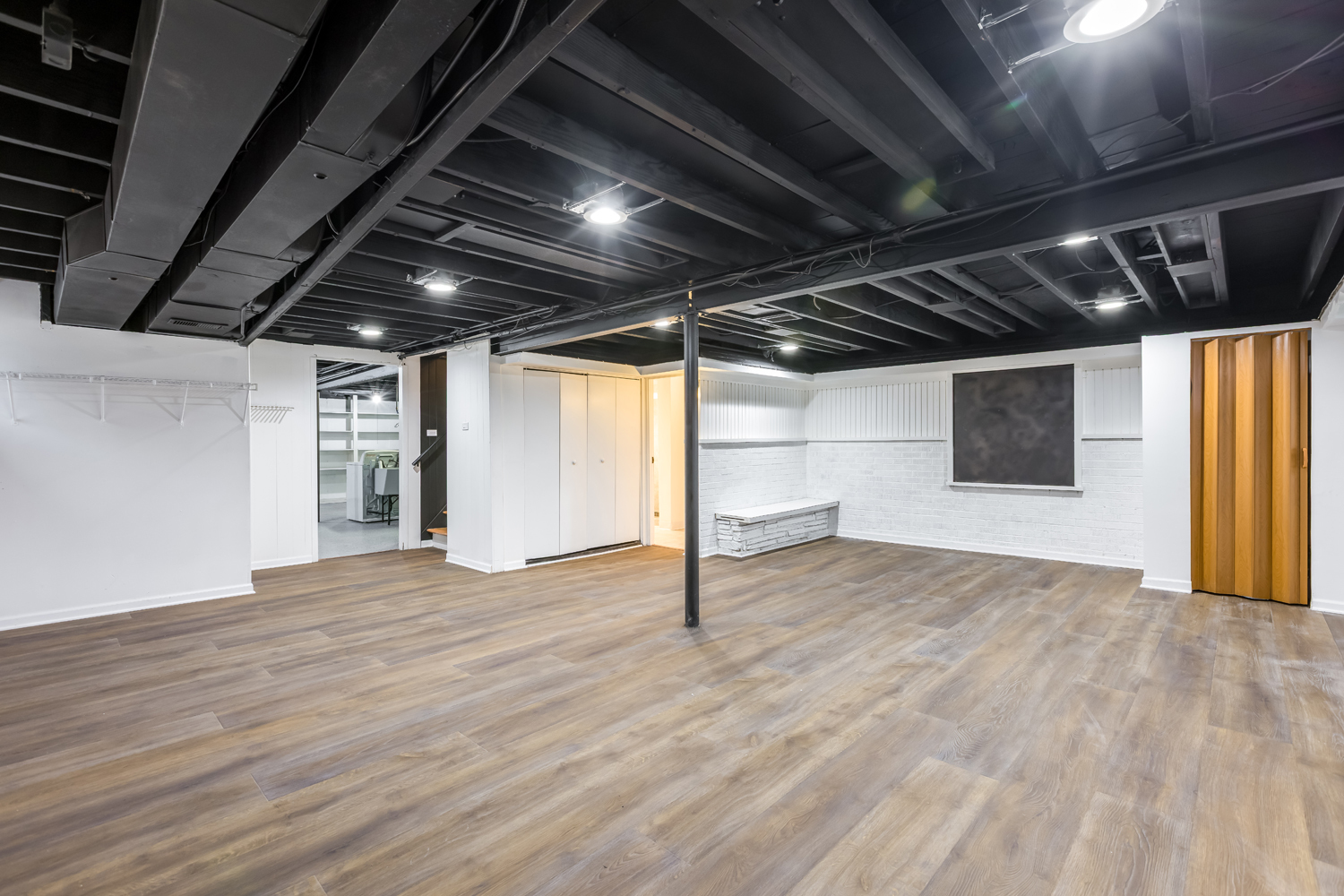 9539 Lorel Avenue Skokie, IL 60077 - Photo 26 of 38 a view of empty room with wooden floor