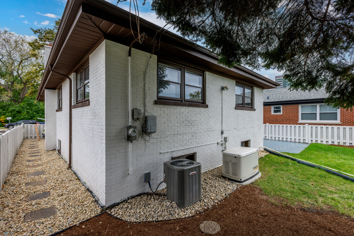 9539 Lorel Avenue Skokie, IL 60077 - Photo 33 of 38 a view of a house with backyard and sitting area