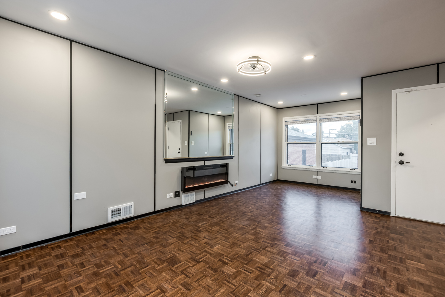 9539 Lorel Avenue Skokie, IL 60077 - Photo 8 of 38 an empty room with windows and closet