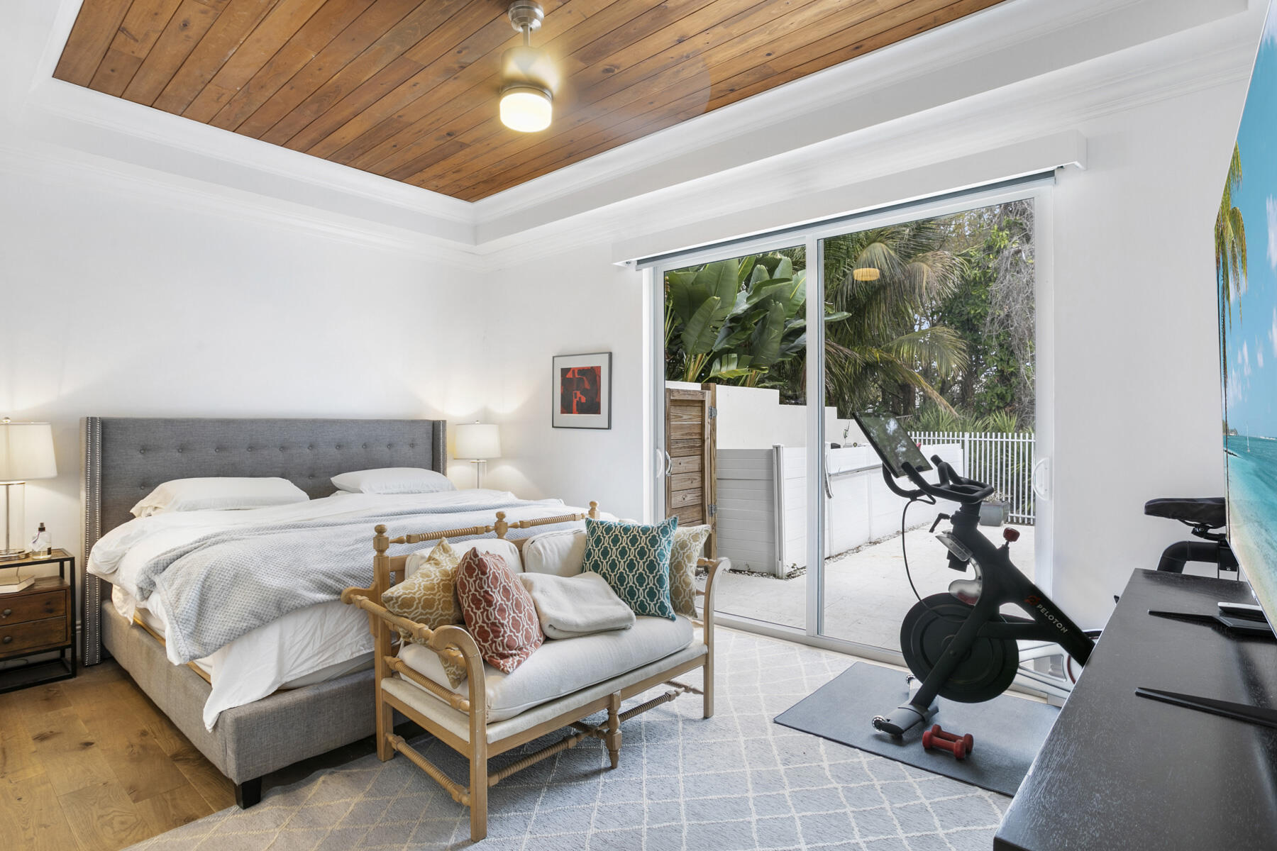 5226 Southeast Inkwood Way Hobe Sound, FL 33455 - Photo 13 of 30 a bedroom with furniture and a large window