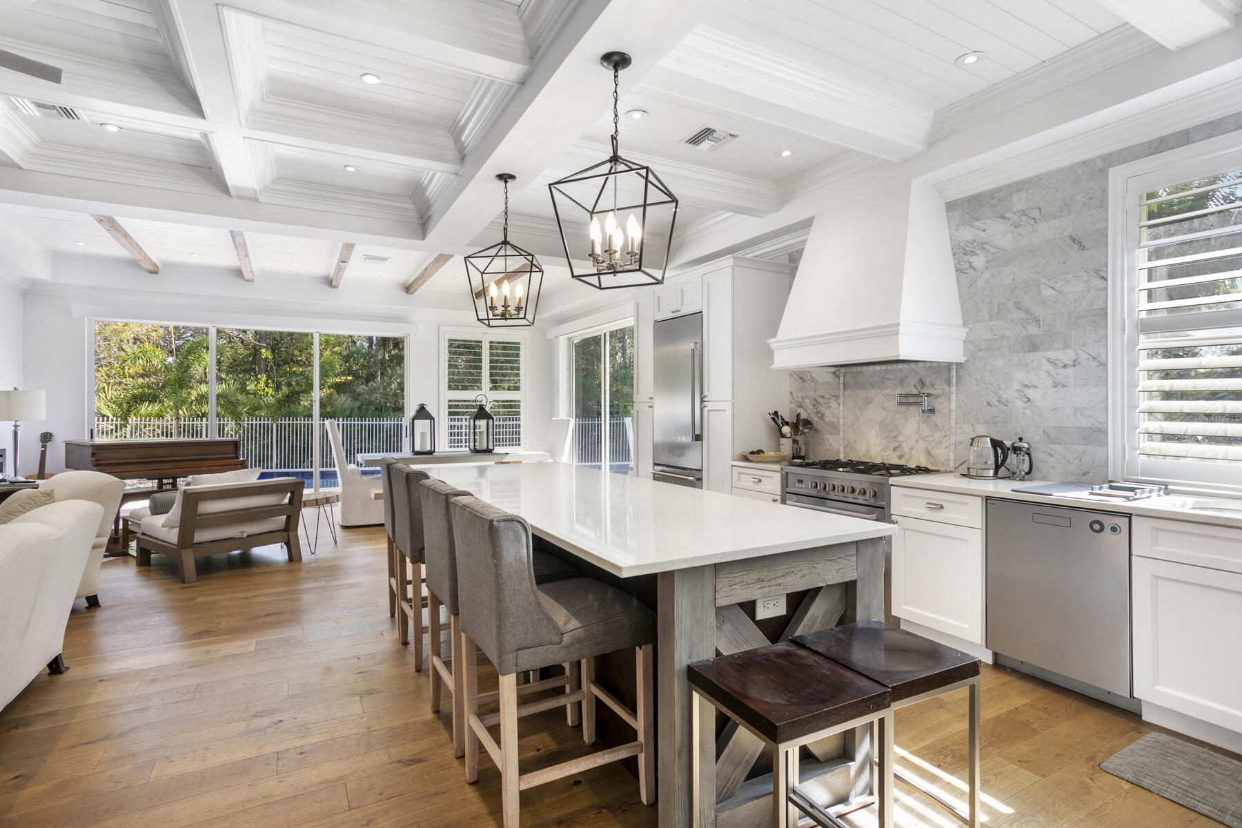 5226 Southeast Inkwood Way Hobe Sound, FL 33455 - Photo 3 of 30 a view of a dining room with furniture window and wooden floor