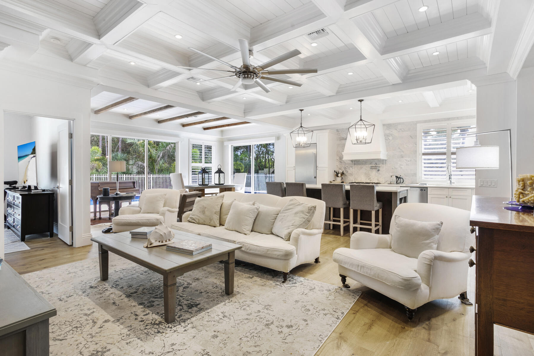 5226 Southeast Inkwood Way Hobe Sound, FL 33455 - Photo 10 of 30 a living room with furniture and a large window