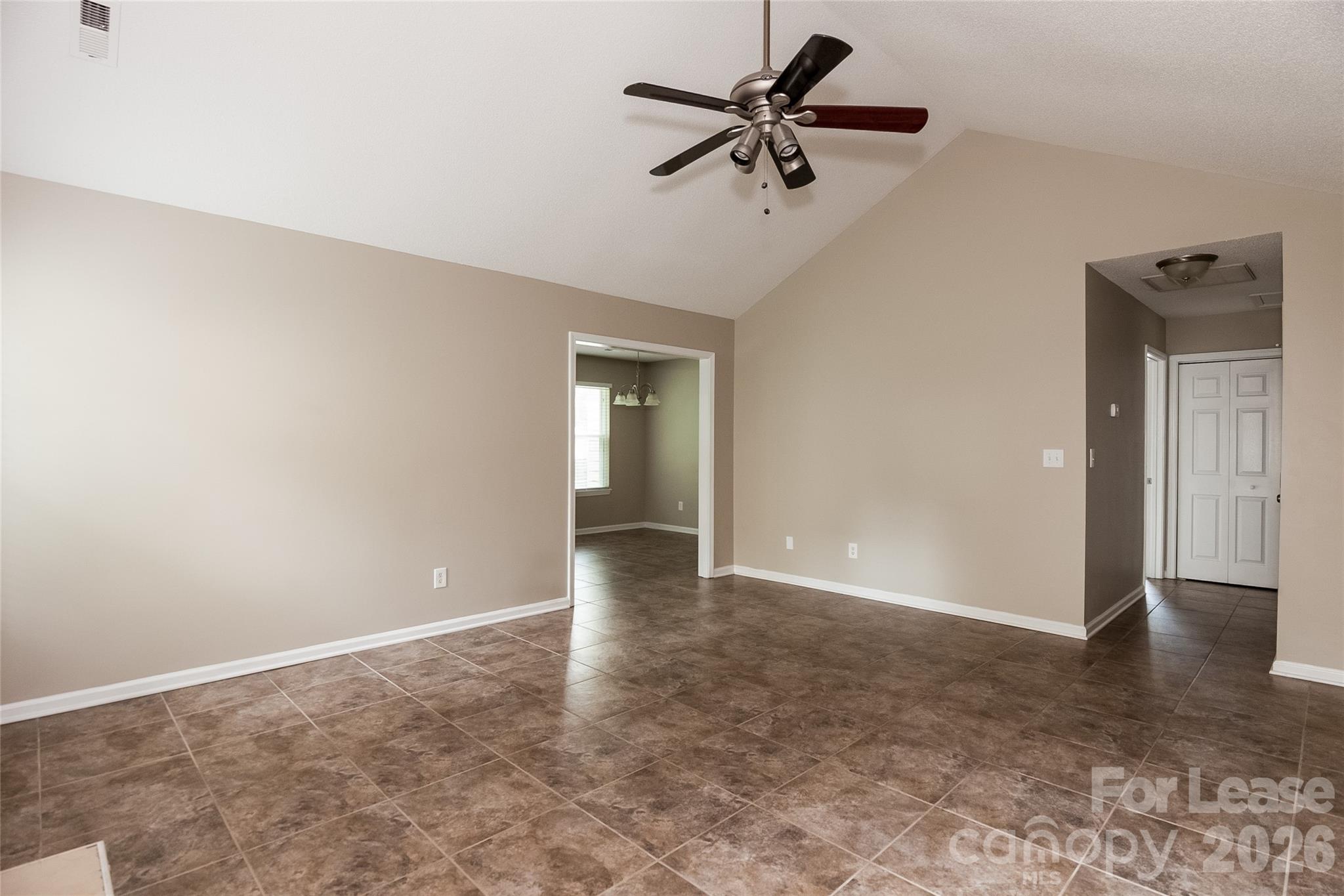 8625 Flowers Court Charlotte, NC 28215 - Photo 4 of 16 wooden floor in an empty room